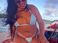 brazilian latina wife rides in bikini on boat