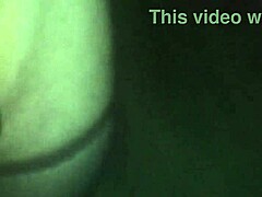 in the woods wearing only g-string and fishnet stockings