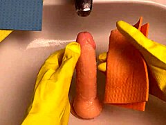 Hot housewife washes dildo after using it in her pussy!