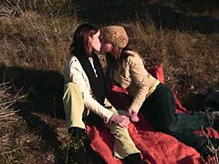 Lesbian Couple Shares Kiss, Then Uses Strapon Outdoors