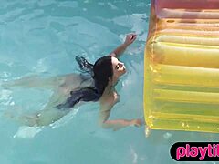 Curvy MILF strips boldly in pool