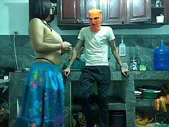 this 25-year-old guy with a big flaccid penis starts masturbating in the kitchen while waiting for his best friend to arrive