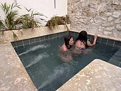 Two hot Colombian lesbians finger and masturbate in public pool. They worry about getting caught outdoors.