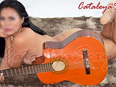 model posing in different outfits and naked with a guitar, it's really sensual... um, like totally captivating ya know