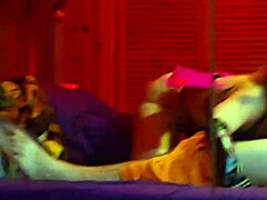 Succubus in cosplay costume blows cock and jerks it off. She licks cum from her glove before swallowing.