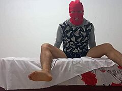 Newbie in the classroom bends over to flash and masturbate with an inflated condom for quick solo thrill.