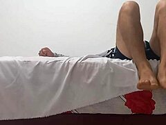 Newbie in the classroom bends over to flash and masturbate with an inflated condom for quick solo thrill.