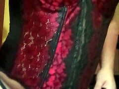 Hey, watch Shirley dancing sexy in her red and black corset