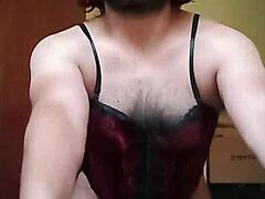 Hey, watch Shirley dancing sexy in her red and black corset
