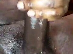 Hinting at Massive Ebony Shaft in Bedroom Solo Session with Tattoos.