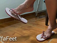 i adore goddess kiffa dangling her flip flops with french nails and toe rings in foot fetish play
