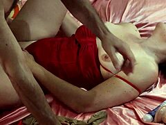 French amateur enjoys clothed sex in red satin bra and thong panties with stockings and heels. She gets rimming, deepthroat, and pussy fuck ending in cumshot.