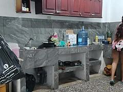 busty maid masturbates in kitchen prepping dinner