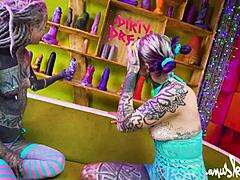 Two tattooed goth lesbians gape shaved assholes with huge anal toys to real orgasms