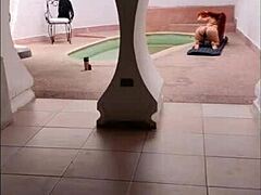 delivery guy catches curvy redhead latina spreading by poolside