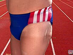 i sneak as track athlete slut giving secret handjob in school uniform outdoors