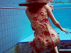 martina croatian redhead strips bikini pool shower nude